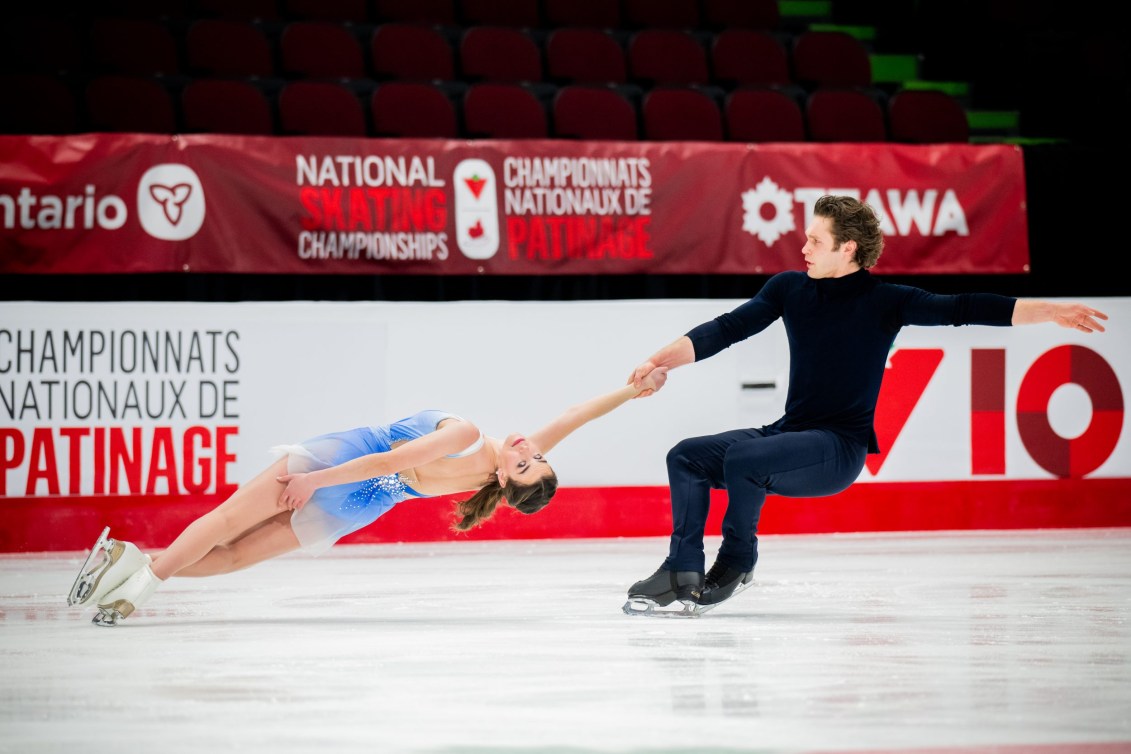 Evelyn Walsh and Trennt Michaud perform a death spiral