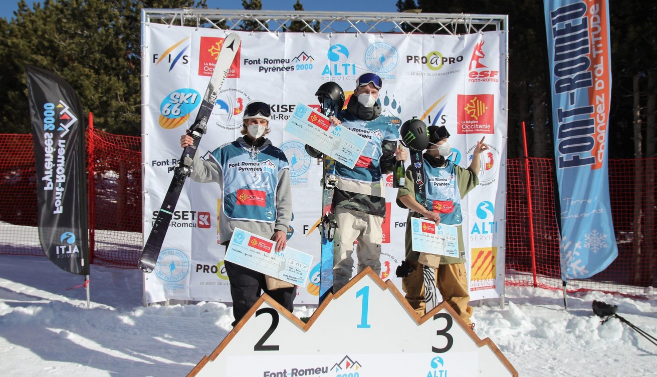 Canadian freestyle skier Edouard Therriault stands on the third step of the podium at the freeski slopestyle World Cup podium in Font-Romeu, France on January 16, 2022.