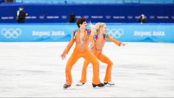 Canadians Piper Gilles and Paul Poirier compete in rhythm dance competition.