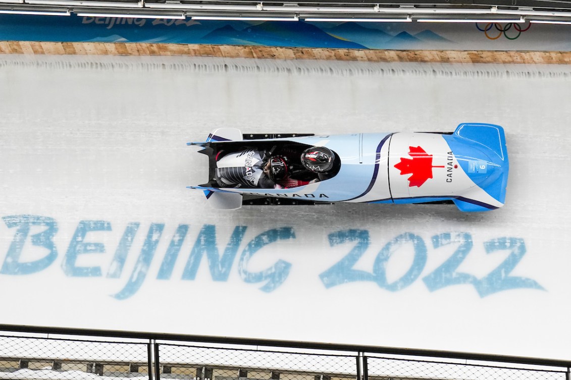 Team Canada’s Christine de Bruin and Kristen Bujnowski compete in the 2-woman bobsleigh heat 3