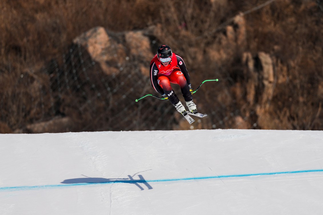 Jack Crawford does a jump in the men's downhill