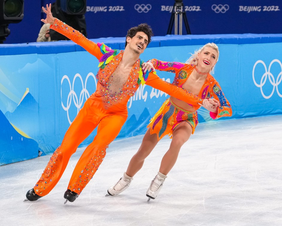 Piper Gilles and Paul Poirier skate side by side