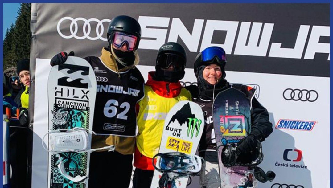 Team Canada's Jasmine Baird poses with silver and bronze medalists after a World Cup run