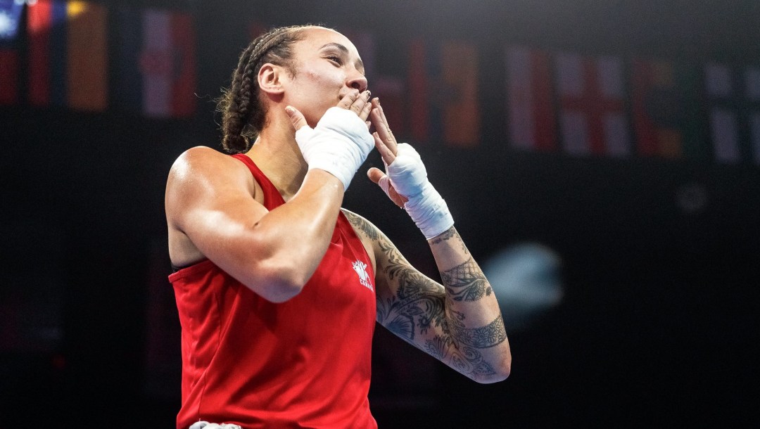 Tammara Thibeault blows kisses after a bout