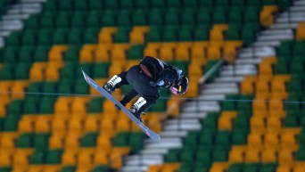 Jasmine Baird, of Canada, makes her jump in The Style Experience FIS Snowboard Big Air World Cup finals in Edmonton on Friday, December 10, 2022.THE CANADIAN PRESS/Jason Franson