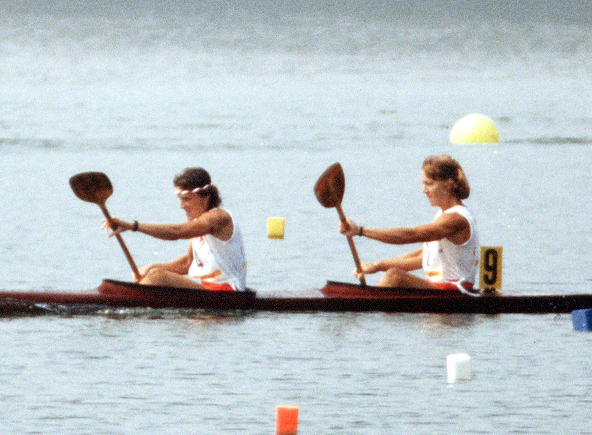 Two female kayakers in a photo from 1984