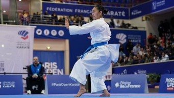 Claudia Laos-Loo performs a stationary move in kata karate