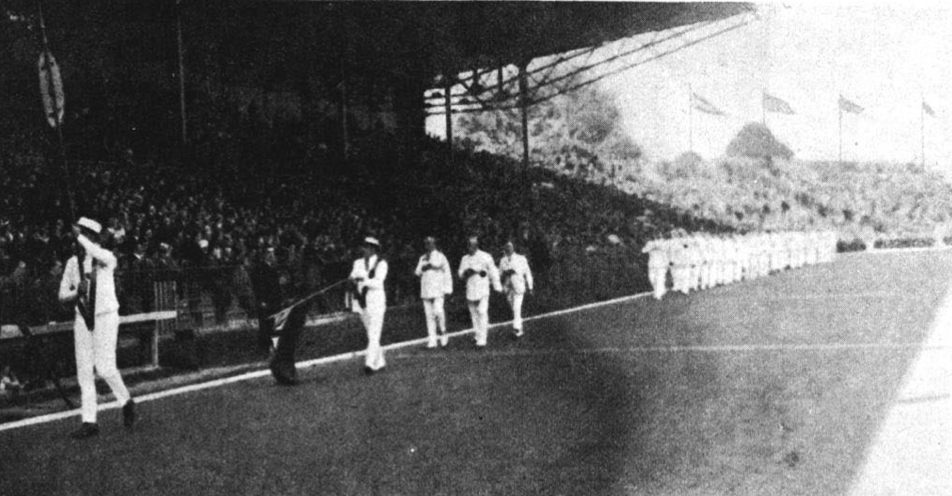 Team Canada marches into the Paris 1924 Olympic Games Opening Ceremony in white uniforms