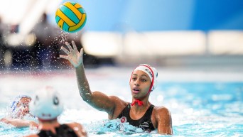 Serena Browne #10 of Canada plays the ball against Argentina in Women’s Water Polo during the Santiago 2023 Pan American Games
