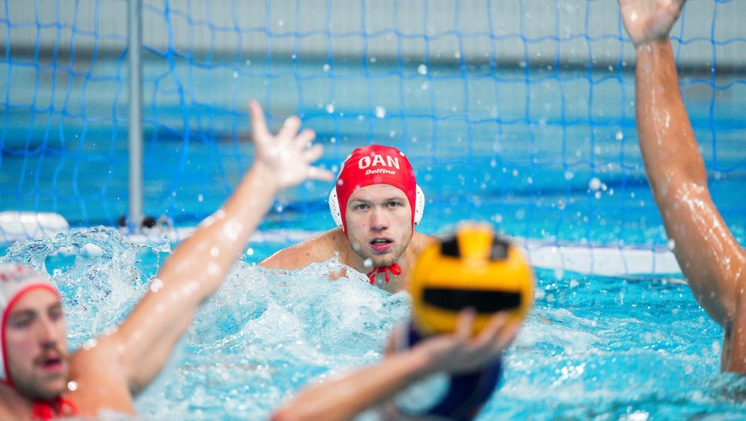 Brody McKnight #13 of Canada defends against Chile in Men’s Water Polo action during the Santiago 2023 Pan American Games