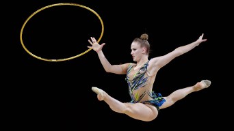 Tatiana Cocsanova jumps with a hoop