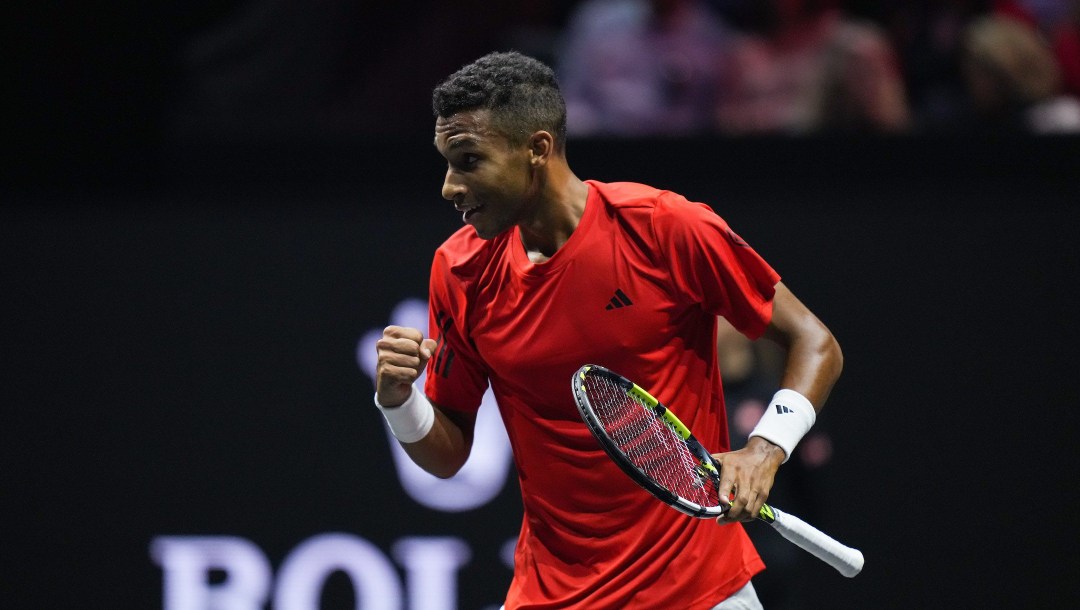 Team World's Felix Auger-Aliassime celebrates winning a game against Team Europe's Gael Monfils during the first set of a Laver Cup tennis singles match, in Vancouver, on Friday, September 22, 2023. THE CANADIAN PRESS/Darryl Dyck