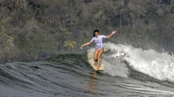 Liv Stokes surfs a wave
