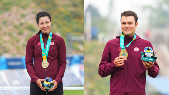 Gunnar Holmgren and Jenn Jackson pose with their medals at the Santiago 2023 Pan Am Games