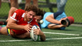 Team Canada's David Richard makes the try against Barbados during men's rugby action at the Rugby Sevens Paris 2024 Olympic qualification event at Starlight Stadium in Langford, B.C