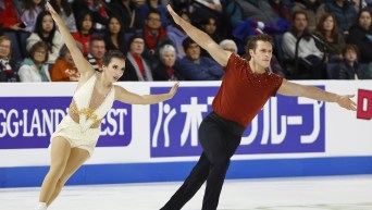 Lia Pereira, left, and Trennt Michaud, of Canada, compete in the pairs free skate program during the Skate America figure skating event in Allen, Texas, Saturday, Oct. 21, 2023. (AP Photo/Roger Steinman)