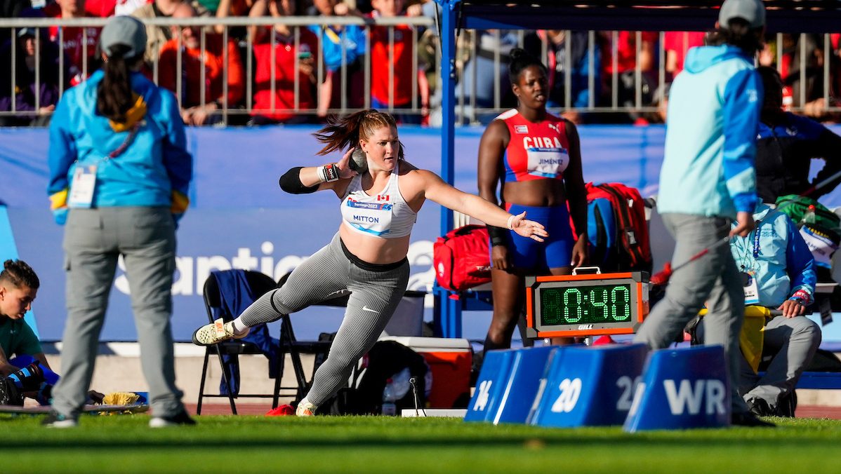 Sarah Mitton prepares to throw a shot put