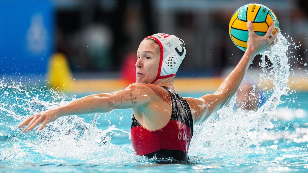 Water polo player Axelle Crevier winds up to take a shot