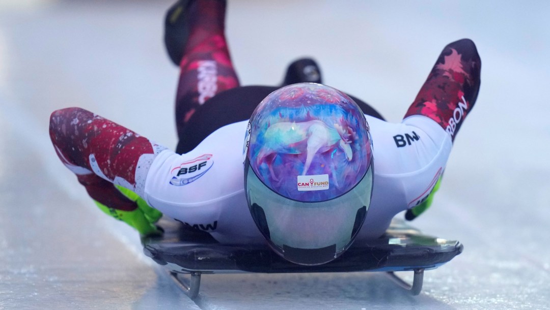 Mirela Rahneva slides on her skeleton sled towards the camera