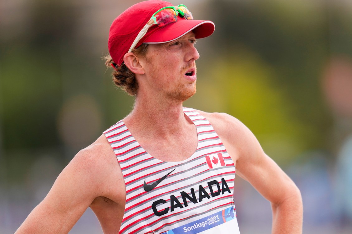 A close up shot of Evan Dunfee while wearing his Team Canada singlet