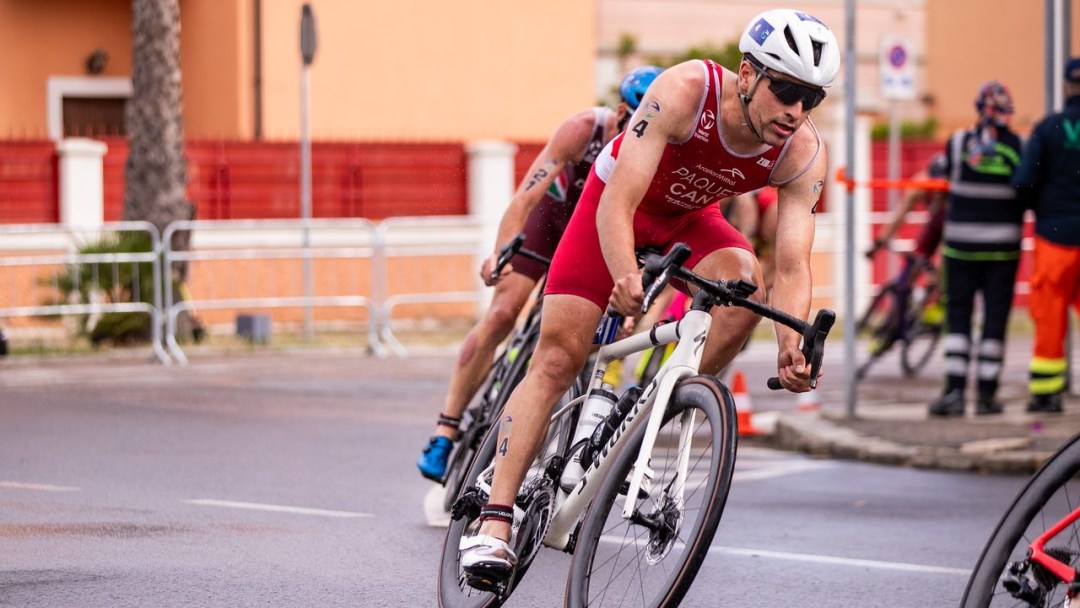 Triathlete Charles Paquet races on his bike