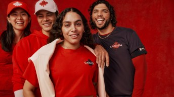 A group of four models wear Team Canada x lululemon gear