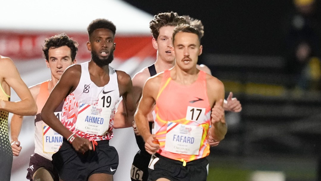 Several male runners race each other