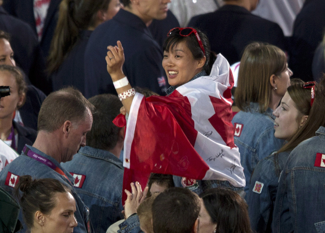 Carol Huynh pendant la cérémonie de clôture des Jeux de Londres le12 août 2012. Photo : THE CANADIAN PRESS/Frank Gunn